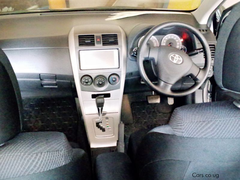 Toyota Fielder DBA-NZE141G-AWXNK-S in Uganda